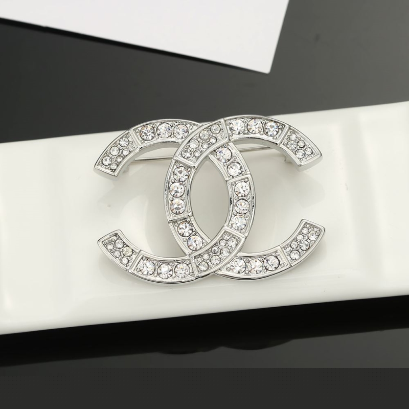 Ch*el brooches